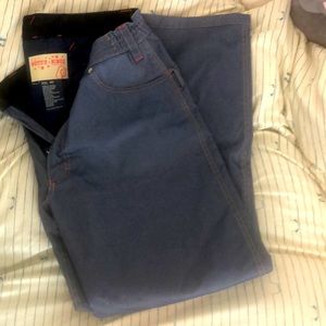 Betty rides denim snow pants